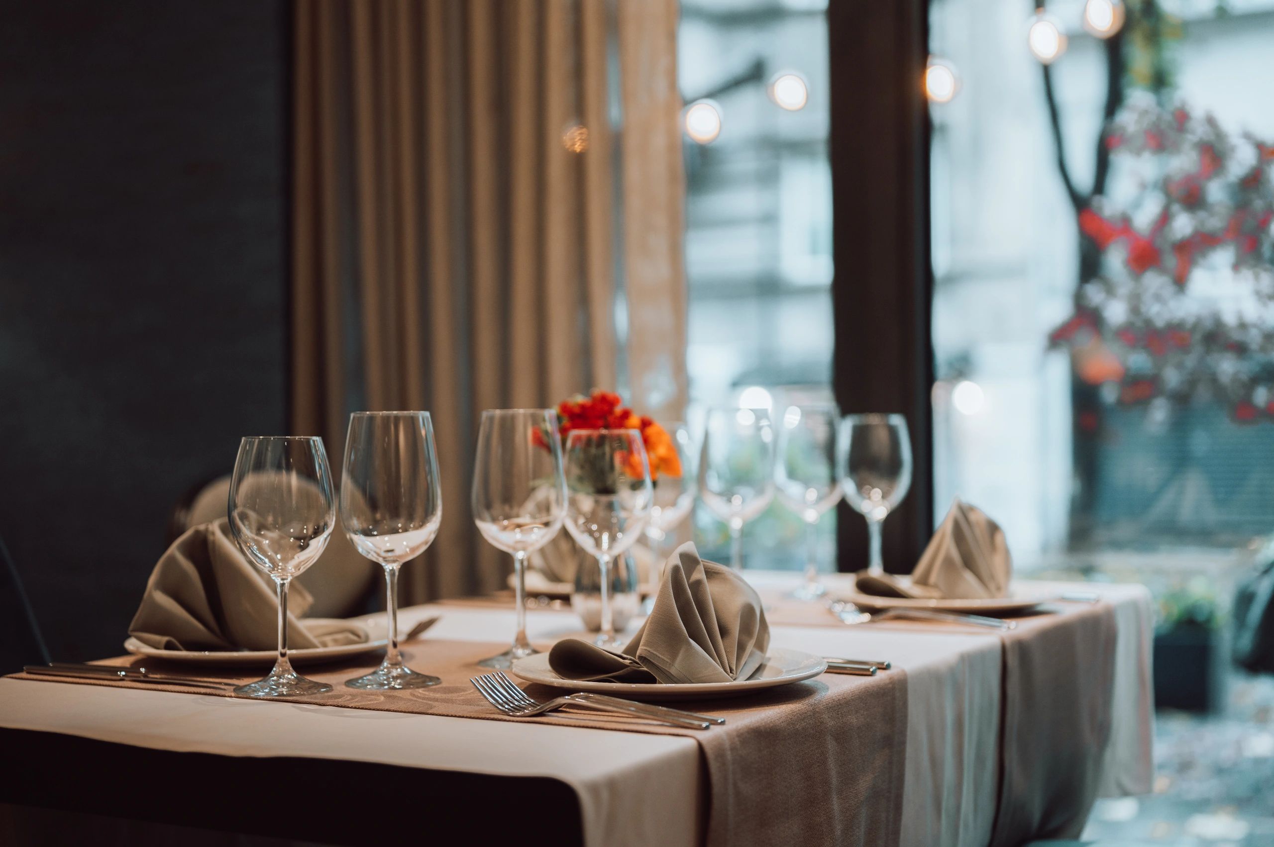Restaurant table prepared for a wine-focused dinner
