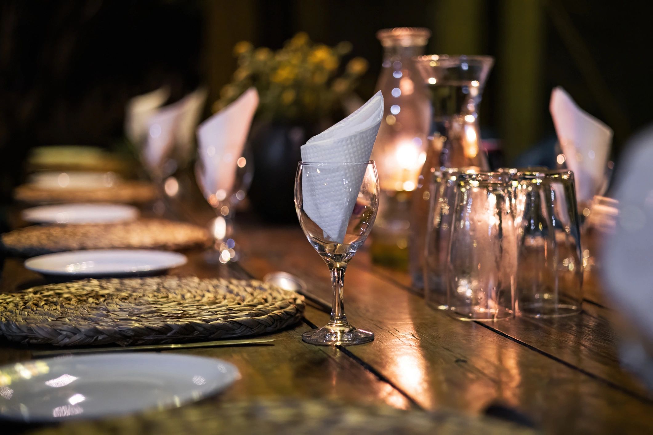 Wine glasses set on an elegant dining table